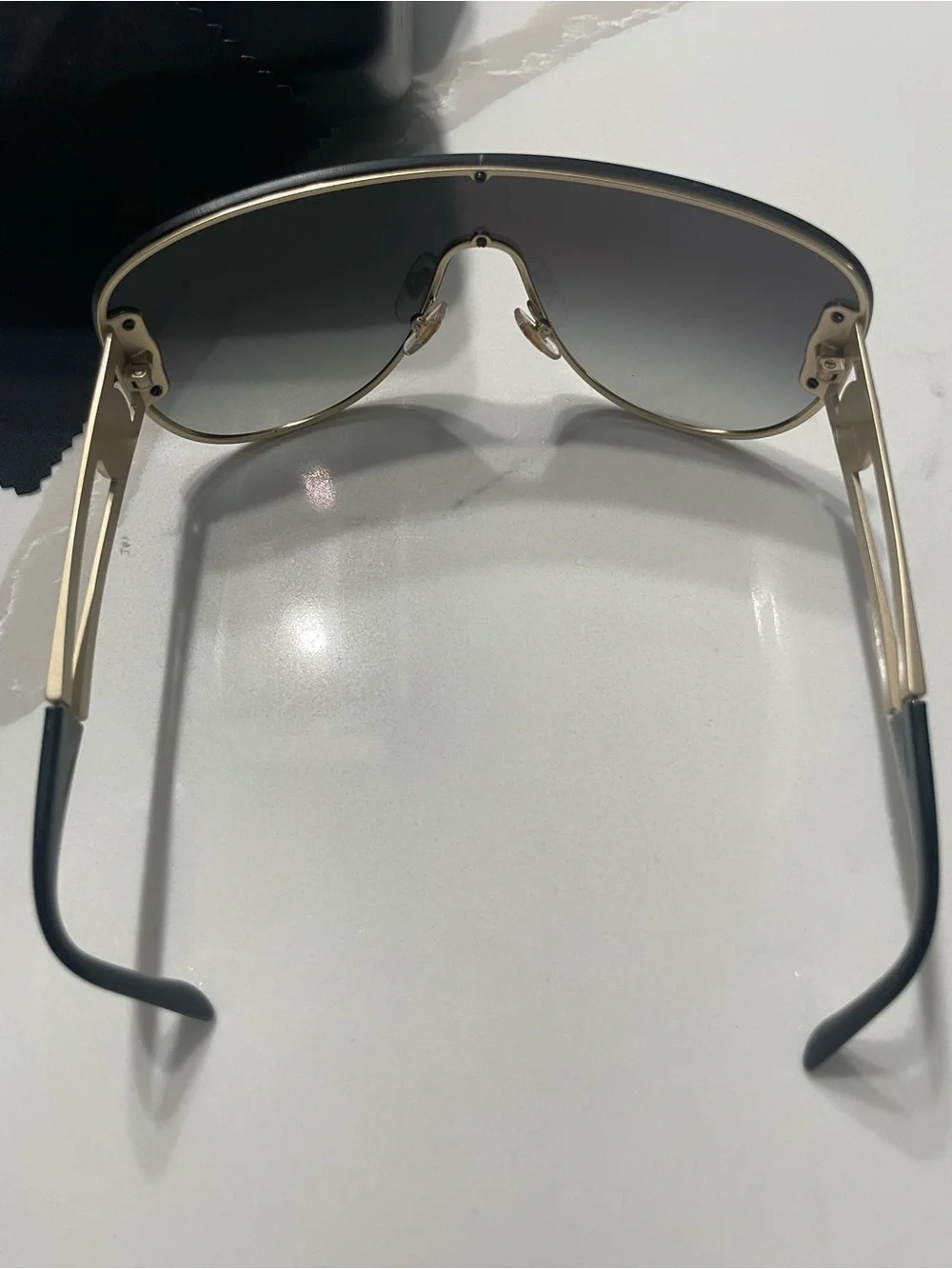 Gucci bold shield
